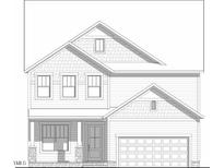 Two-story home with detailed trim, a covered porch, and an attached two-car garage at 249 Murray Grey Ln, Wake Forest, NC 27587