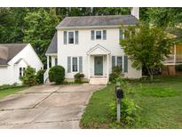 Charming two-story home with a well-manicured lawn and inviting front entrance at 713 Saint Catherines Dr, Wake Forest, NC 27587