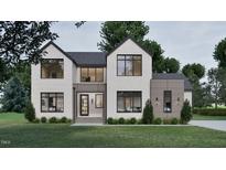 Stunning exterior elevation featuring a modern design with black window frames and neutral color palette at 429 Shinleaf Pond Trl, Raleigh, NC 27614