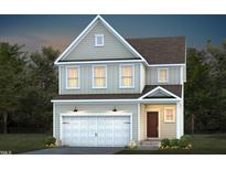 Charming two-story home with a two-car garage and professionally landscaped front yard at 432 Grange Farm Pl, Raleigh, NC 27603
