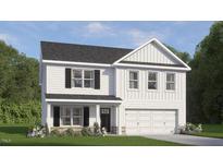New construction two-story home boasting white siding, black shutters, and an attached two-car garage at 48 Lone Star Dr, Lillington, NC 27546