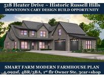 Charming modern farmhouse with a three-car garage, lush lawn, and craftsman-style details at 518 Heater Dr # B, Cary, NC 27511