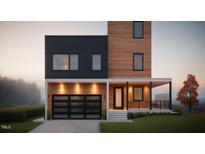 Stunning modern home featuring a unique design with a black and wood facade, a glass garage door, and manicured lawn at 521 Coleman St, Raleigh, NC 27610