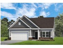 Charming single-story home with a two-car garage, gray siding, and a gabled roof, complemented by professionally landscaped grounds at 80 Pine Vista Way, Sanford, NC 27332