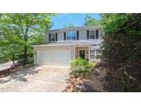 Charming two-story home with a two-car garage and well-maintained landscaping at 916 Woodside Park Ln, Durham, NC 27704