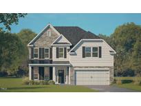 Charming two-story home featuring a mix of stone and siding, complemented by black shutters, a well-manicured lawn, and an attached garage at 409 Falls Bluff Dr, Wake Forest, NC 27596