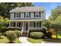 Charming two-story home with a inviting front porch and manicured landscaping at 112 Autumn Ridge Dr, Knightdale, NC 27545