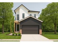 Modern two-story home featuring white siding, a dark gray garage, and a well-manicured front lawn at 322 S Dixon Ave # R, Cary, NC 27511