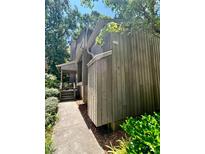 Charming two-story condo with a private entrance and well-maintained exterior, located in a serene neighborhood at 406 Fairoaks Cir, Chapel Hill, NC 27516