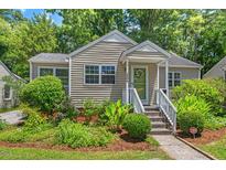 Charming home with a well-maintained front yard and inviting entrance, enhancing curb appeal at 2504 State St, Durham, NC 27704