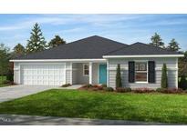 Beautiful single-story home featuring manicured lawn, attached garage, and bright blue front door at 189 Gobbler Dr, Smithfield, NC 27577