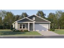 Charming single-story home with attached garage, neutral paint, shingle accents and landscaped front yard at 180 Digging Time Ave, Princeton, NC 27569