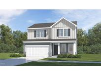 Charming two-story home featuring a modern design and inviting curb appeal at 40 Digging Time Ave, Princeton, NC 27569
