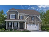 Charming two-story home featuring stone accents, gray siding, a covered porch, and an attached two-car garage at 3202 Armeria Dr, Apex, NC 27502