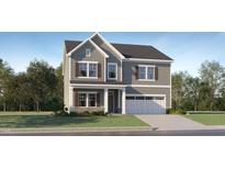 Charming two-story home with gray siding, stone accents, shutters, and a two-car garage at 182 E Fountainhead Ln, Garner, NC 27529