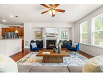 Bright living room with modern fireplace, decor, and furniture creating a cozy and inviting atmosphere at 4963 Highcroft Dr, Cary, NC 27519