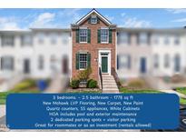 Inviting brick townhome with well-maintained landscaping and a charming green front door at 5505 Crabtree Park Ct, Raleigh, NC 27612