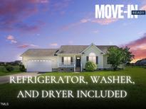 Charming single story home with a manicured lawn, two car garage, and front porch at 108 Hudson Dr, Princeton, NC 27569