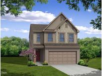 Charming two-story home with a symmetrical facade, a two-car garage, and a well-manicured front lawn at 691 Highveiw Dr, Benson, NC 27504