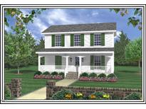 Charming two-story home featuring a welcoming front porch, green shutters, and beautifully landscaped front yard at 605 Sania Ct, Graham, NC 27253