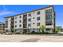 Stylish condo building with modern architectural details and private balcony views at 105 Chatham Walk Ln # 304, Cary, NC 27511