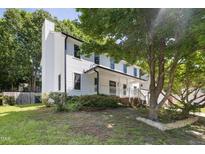 Charming two-story home with a welcoming front porch and well-maintained landscaping at 3421 Tunas St, Raleigh, NC 27616