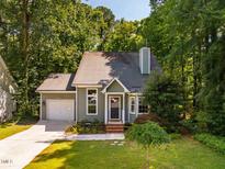 Charming one-story home featuring a well-maintained lawn and a welcoming front entrance at 4117 Olde Coach Rd, Durham, NC 27707