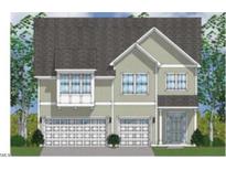 Charming two-story home with a two-car garage and inviting facade showcasing classic architectural elements at 346 N Maple Walk Dr # 243, Garner, NC 27529