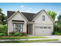 Charming new construction with neutral siding, black window trim, and an attached two-car garage at 64 Firefly Ln, Fuquay Varina, NC 27526