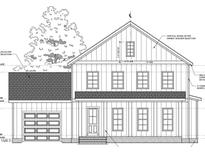 Detailed elevation showing vertical siding, brick foundation, and garage at 371 Water Tower Rd, Moncure, NC 27559