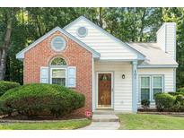 Charming single-Gathering home with a brick facade, decorative trim, and well-maintained landscaping at 108 Ellsworth Pl, Cary, NC 27511