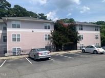 Charming apartment complex with ample parking and lush landscaping at 929 Morreene Rd # D-34, Durham, NC 27705