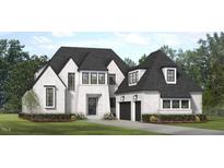 Charming two-story home with a brick exterior, black framed windows, and a two-car garage, surrounded by lush landscaping at 1033 Azalea Garden Cir, Raleigh, NC 27603