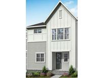 Charming two-story home boasts a modern design and a well-maintained landscaped front yard at 610 Callan View Ave, Wake Forest, NC 27587