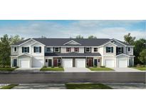 New townhomes with attached garages feature classic architectural details and neutral color schemes at 507 Eastwood St, Durham, NC 27704