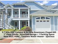 Charming two-story condo with attached garage and private outdoor spaces in a desirable location at 511 Hillsborough St # Bldg B 106, Chapel Hill, NC 27514