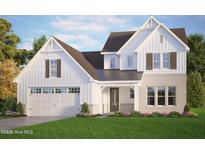Charming new construction two-story home featuring board and batten siding and a two-car garage at 23 W Victoria Ridge Dr # 33, Selma, NC 27576