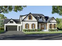 Stunning new construction home with a black roof, white siding, wood shutters and a dark gray garage door at 110 Broadleaf Ln, Louisburg, NC 27549