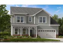 Charming two-story home with a welcoming front porch and attached two-car garage at 124 Seagraves Creek Ln, Holly Springs, NC 27540