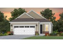 Charming home showcasing a tan exterior, brick accents, and a spacious two-car garage at 181 Churchill Way, Clayton, NC 27520