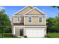 Charming two-story home featuring a covered front porch, attached two-car garage, and neatly landscaped surroundings at 235 Faith Avenue, Sanford, NC 27330