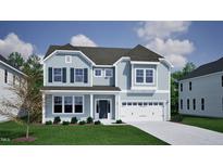 Charming two-story home with blue siding, black shutters, well-manicured lawn, and attached garage at 115 Guardian St, Youngsville, NC 27596
