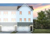 Charming new two-story home featuring a light color scheme, inviting entrance, and attached garage, perfect for modern living at 1516 Tamarisk Ln, Durham, NC 27703