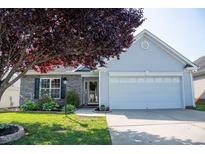 Charming single-story home with well-maintained lawn and an attached two-car garage at 326 Slate Dr, Gibsonville, NC 27249