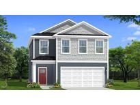 Charming two-story home featuring a red door, a two-car garage, and a mix of horizontal and shake siding at 130 Favored Avenue, Sanford, NC 27330