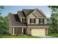 New two story home with a brick and vinyl exterior, well manicured lawn, and attached garage at 239 Faith Avenue, Sanford, NC 27330