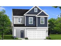 New construction home featuring blue and grey siding, a two-car garage, and an eye-catching, symmetrical design at 134 Favored Avenue, Sanford, NC 27330