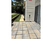 Private patio with easy access to outdoors at 2221 Valley Edge Dr # 100, Raleigh, NC 27614