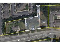 Aerial view showing property boundaries and nearby commercial and residential areas at 4503 Hopson Rd, Morrisville, NC 27560