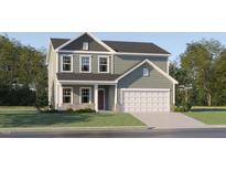 Charming two-story home with stone accents, neutral siding and an attached two-car garage at 576 Roy Adams Ct, Angier, NC 27501
